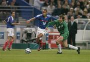 9 October 2004; theirry Henry, France, in action against Kevin Kilbane, Republic of Ireland. FIFA World Cup 2006 Qualifier, France v Republic of Ireland, Stade de France, Paris, France. Picture credit; Brendan Moran / SPORTSFILE