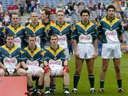 17 October 2004; Ireland's Setanta O hAilpin, right, stands next to his brother Sean Og and the rest of the Irish team during the team photograph. Coca Cola International Rules Series 2004, First Test, Ireland v Australia, Croke Park, Dublin. Picture credit; Brendan Moran / SPORTSFILE *** Local Caption *** Any photograph taken by SPORTSFILE during, or in connection with, the 2004 Coca Cola International Rules Series which displays GAA logos or contains an image or part of an image of any GAA intellectual property, or, which contains images of a GAA player/players in their playing uniforms, may only be used for editorial and non-advertising purposes.  Use of photographs for advertising, as posters or for purchase separately is strictly prohibited unless prior written approval has been obtained from the Gaelic Athletic Association.