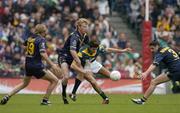17 October 2004; Setanta O hAilpin, Ireland, in action against Joel Corey (19), Craig Bolton and Brady Rawlings (3), Australia. Coca Cola International Rules Series 2004, First Test, Ireland v Australia, Croke Park, Dublin. Picture credit; Brendan Moran / SPORTSFILE *** Local Caption *** Any photograph taken by SPORTSFILE during, or in connection with, the 2004 Coca Cola International Rules Series which displays GAA logos or contains an image or part of an image of any GAA intellectual property, or, which contains images of a GAA player/players in their playing uniforms, may only be used for editorial and non-advertising purposes.  Use of photographs for advertising, as posters or for purchase separately is strictly prohibited unless prior written approval has been obtained from the Gaelic Athletic Association.