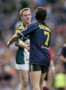 17 October 2004; David Heaney, Ireland, shakes hands with Dean Solomon, Australia, after the final whistle. Coca Cola International Rules Series 2004, First Test, Ireland v Australia, Croke Park, Dublin. Picture credit; Brendan Moran / SPORTSFILE *** Local Caption *** Any photograph taken by SPORTSFILE during, or in connection with, the 2004 Coca Cola International Rules Series which displays GAA logos or contains an image or part of an image of any GAA intellectual property, or, which contains images of a GAA player/players in their playing uniforms, may only be used for editorial and non-advertising purposes.  Use of photographs for advertising, as posters or for purchase separately is strictly prohibited unless prior written approval has been obtained from the Gaelic Athletic Association.