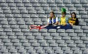 17 October 2004; Australian fans sit in the stand before the game. Coca Cola International Rules Series 2004, First Test, Ireland v Australia, Croke Park, Dublin. Picture credit; Brendan Moran / SPORTSFILE *** Local Caption *** Any photograph taken by SPORTSFILE during, or in connection with, the 2004 Coca Cola International Rules Series which displays GAA logos or contains an image or part of an image of any GAA intellectual property, or, which contains images of a GAA player/players in their playing uniforms, may only be used for editorial and non-advertising purposes.  Use of photographs for advertising, as posters or for purchase separately is strictly prohibited unless prior written approval has been obtained from the Gaelic Athletic Association.