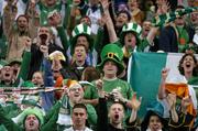 9 October 2004;  Republic of Ireland supporters cheer on their team. FIFA World Cup 2006 Qualifier, France v Republic of Ireland, Stade de France, Paris, France. Picture credit; David Maher / SPORTSFILE