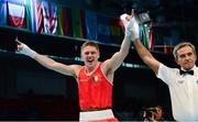 23 October 2013; Jason Quigley, Finn Valley BC, Donegal, representing Ireland, celebrates after beating Zoltan Harsca, Hungary, in their Men's Middleweight 75Kg Quarter-Final bout. AIBA World Boxing Championships Almaty 2013, Almaty, Kazakhstan. Photo by Sportsfile