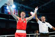 23 October 2013; Jason Quigley, Finn Valley BC, Donegal, representing Ireland, celebrates after beating Zoltan Harsca, Hungary, in their Men's Middleweight 75Kg Quarter-Final bout. AIBA World Boxing Championships Almaty 2013, Almaty, Kazakhstan. Photo by Sportsfile