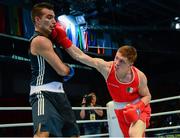 23 October 2013; Jason Quigley, right, Finn Valley BC, Donegal, representing Ireland, exchanges punches with Zoltan Harsca, Hungary, during their Men's Middleweight 75Kg Quarter-Final bout. AIBA World Boxing Championships Almaty 2013, Almaty, Kazakhstan. Photo by Sportsfile