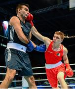 23 October 2013; Jason Quigley, right, Finn Valley BC, Donegal, representing Ireland, exchanges punches with Zoltan Harsca, Hungary, during their Men's Middleweight 75Kg Quarter-Final bout. AIBA World Boxing Championships Almaty 2013, Almaty, Kazakhstan. Photo by Sportsfile