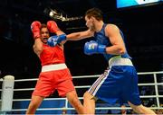 23 October 2013; Yamil Peralta, right, Argentina, exchanges punches with Thomas McCarthy, Oliver Plunkett BC, Belfast, during their Men's Heavyweight 91Kg Quarter-Final bout. AIBA World Boxing Championships Almaty 2013, Almaty, Kazakhstan. Photo by Sportsfile