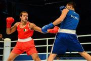 23 October 2013; Thomas McCarthy, left, Oliver Plunkett BC, Belfast, representing Ireland, exchanges punches with Yamil Peralta, Argentina, during their Men's Heavyweight 91Kg Quarter-Final bout. AIBA World Boxing Championships Almaty 2013, Almaty, Kazakhstan. Photo by Sportsfile