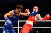 23 October 2013; Jasurbek Latipov, left, Uzbekistan, exchanges punches with Paddy Barnes, Holy Family BC, Belfast, representing, Ireland, during their Men's Flyweight 52Kg Quarter-Final bout. AIBA World Boxing Championships Almaty 2013, Almaty, Kazakhstan. Photo by Sportsfile