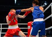 23 October 2013; Jasurbek Latipov, right, Uzbekistan, exchanges punches with Paddy Barnes, Holy Family BC, Belfast, representing, Ireland, during their Men's Flyweight 52Kg Quarter-Final bout. AIBA World Boxing Championships Almaty 2013, Almaty, Kazakhstan. Photo by Sportsfile
