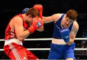 23 October 2013; Joe Ward, right, Moate BC, Co. Westmeath, representing Ireland, exchanges punches with Nikita Ivanov, Russia, during their Men's Light-Heavyweight 81Kg Quarter-Final bout. AIBA World Boxing Championships Almaty 2013, Almaty, Kazakhstan. Photo by Sportsfile