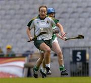 17 October 2004; Annette McGeeney, Ireland, in action against Roisin O'Neill, Britain. 2004 Coca Cola International Camogie Competition Final, Ireland v Britain, Croke Park, Dublin. Picture credit; Brian Lawless / SPORTSFILE