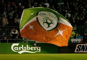 13 October 2004; A Republic of Ireland fan waves a large FAI flag during the game. FIFA 2006 World Cup Qualifier, Republic of Ireland v Faroe Islands, Lansdowne Road, Dublin. Picture credit; Brendan Moran / SPORTSFILE
