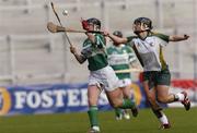 17 October 2004; Anne Marie O'Dwyer, Britain, in action against Yvonne Carney, Ireland. 2004 Coca Cola International Camogie Competition Final, Ireland v Britain, Croke Park, Dublin. Picture credit; Brian Lawless / SPORTSFILE