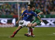 9 October 2004; Robert Pires, France, in action against Steve Finnan, Republic of Ireland. FIFA World Cup 2006 Qualifier, France v Republic of Ireland, Stade de France, Paris, France. Picture credit; David Maher / SPORTSFILE
