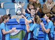 24 October 2004; Sylivia Gee, UCD captain, lifts the Senior cup at the end of the game after victory over Dundalk. 2004 FAI Ladies National Senior Cup Final, UCD v Dundalk, Lansdowne Road, Dublin. Picture credit; David Maher / SPORTSFILE