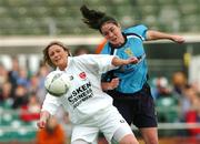 24 October 2004; Claire Riordan, Dundalk, in action against Nora Stapleton, UCD. 2004 FAI Ladies National Senior Cup Final, UCD v Dundalk, Lansdowne Road, Dublin. Picture credit; David Maher / SPORTSFILE