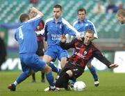24 October 2004; Sean Prunty, Longford Town, in action against Alan Reynolds, 4, and Alan Carey, Waterford United. 2004 FAI Carlsberg Cup Final, Longford Town v Waterford United, Lansdowne Road, Dublin. Picture credit; Matt Browne / SPORTSFILE