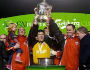 24 October 2004; Longford Town's Barry Fergusion, left, Stephen O'Brien and manager Alan Matthews, right, lift the FAI Cup after victory against Waterford United. 2004 FAI Carlsberg Cup Final, Longford Town v Waterford United, Lansdowne Road, Dublin. Picture credit; Matt Browne / SPORTSFILE