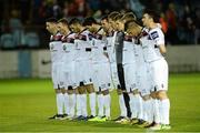25 October 2013; Bohemians players stand for a minute silence in honour of the late Dundalk FC legend Tommy McConville. Airtricity League Premier Division, Drogheda United v Bohemians, Hunky Dorys Park, Drogheda, Co. Louth. Picture credit: David Maher / SPORTSFILE