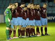 25 October 2013; Drogheda United players stand for a minute silence in honour of the late Dundalk FC legend Tommy McConville. Airtricity League Premier Division, Drogheda United v Bohemians, Hunky Dorys Park, Drogheda, Co. Louth. Picture credit: David Maher / SPORTSFILE