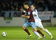 25 October 2013; Declan O'Brien, Drogheda United, in action against Derek Pender, Bohemians. Airtricity League Premier Division, Drogheda United v Bohemians, Hunky Dorys Park, Drogheda, Co. Louth. Picture credit: David Maher / SPORTSFILE