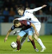 25 October 2013; Declan O'Brien, Drogheda United, in action against Derek Pender, Bohemians. Airtricity League Premier Division, Drogheda United v Bohemians, Hunky Dorys Park, Drogheda, Co. Louth. Picture credit: David Maher / SPORTSFILE