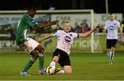 25 October 2013; Chris Shields, Dundalk, gets a tackle in on Ismahil Akinade, Bray Wanderers. Airtricity League Premier Division, Bray Wanderers v Dundalk, Carlisle Grounds, Bray, Co. Wicklow. Picture credit: Ramsey Cardy / SPORTSFILE