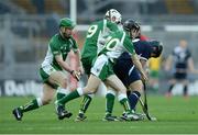 26 October 2013; Cahir Healy, left, Jack Kavanagh and Brendan Maher, Ireland, in action against Daniel Cameron, Scotland. Shinty International First Test, Ireland v Scotland, Croke Park, Dublin. Picture credit: Ramsey Cardy / SPORTSFILE