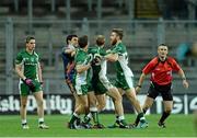 26 October 2013; Players from both sides, including Zach Tuohy, Ireland, and Aaron Davey, Australia, during an altercation before the start of the game. International Rules Second Test, Ireland v Australia, Croke Park, Dublin. Picture credit: Ramsey Cardy / SPORTSFILE