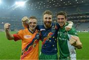 26 October 2013; Ireland players, from left, Ross Munnelly, Zach Tuohy and Colm Begley celebrate after the game. International Rules Second Test, Ireland v Australia, Croke Park, Dublin. Picture credit: Ray McManus / SPORTSFILE