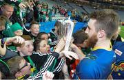 26 October 2013; Ireland's Zach Tuohy celebrates with supporters and the Cormac McAnallen cup. International Rules Second Test, Ireland v Australia, Croke Park, Dublin. Picture credit: Ramsey Cardy / SPORTSFILE