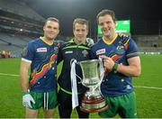 26 October 2013; Neil McGee, left, Nicholas Walsh and Michael Murphy, right, Ireland, with the Cormac McAnallen cup after the game. International Rules Second Test, Ireland v Australia, Croke Park, Dublin. Picture credit: Ray McManus / SPORTSFILE