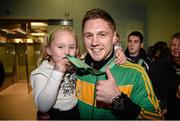 27 October 2013; Ireland's Jason Quigley, from Finn Valley BC, Donegal, with his AIBA World Boxing Championships silver medal and his six year old sister Holli on his arrival home from the AIBA World Boxing Championships Almaty 2013 in Kazakhstan. Dublin Airport, Dublin. Photo by Sportsfile