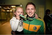 27 October 2013; Ireland's Jason Quigley, from Finn Valley BC, Donegal, with his AIBA World Boxing Championships silver medal and his six year old sister Holli on his arrival home from the AIBA World Boxing Championships Almaty 2013 in Kazakhstan. Dublin Airport, Dublin. Photo by Sportsfile