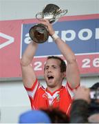 27 October 2013; Neil McGarry, Loughgiel Shamrocks, lifts the cup. AIB Ulster Senior Club Hurling Championship Final, Loughgiel Shamrocks v Slaughneil, Celtic Park, Derry. Picture credit: Ramsey Cardy / SPORTSFILE