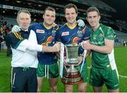 26 October 2013; Dr Kevin Moran, left, celebrates with Ireland players, from left, Neil McGee, Michael Murphy and Paddy McBrearty with the Cormac McAnallen cup after the game. International Rules Second Test, Ireland v Australia, Croke Park, Dublin. Picture credit: Oliver McVeigh / SPORTSFILE