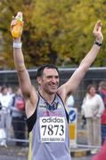 25 October 2004; Actor Tony Auden Shaw, who plays the character of Bob Hope in the TV soap Emmerdale, celebrates after finishing the race. adidas Dublin City Marathon 2004. Merrion Square, Dublin. Picture credit; Brendan Moran / SPORTSFILE