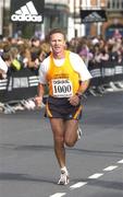 25 October 2004; Eamonn Coghlan, of Ireland, comes down the finishing straight after he and his team ran to raise money for Our Lady's Hospital for Sick Children in Crumlin. adidas Dublin City Marathon 2004. Merrion Square, Dublin. Picture credit; Brendan Moran / SPORTSFILE