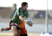 30 October 2004; James Downey, Connacht, is tackled by Jean-Philippe Viard, Narbonne. European Challenge Cup, Connacht v Narbonne, 2nd Leg,  Sportsground, Galway. Picture credit; Damien Eagers / SPORTSFILE