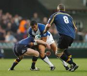 30 October 2004; Zak Feaunati, Bath, is tackled by David Holwell, left, and Victor Costello, Leinster. Heineken European Cup 2004-2005, Leinster v Bath, Lansdowne Road, Dublin. Picture credit; Pat Murphy / SPORTSFILE