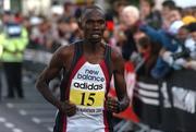 25 October 2004; Joseph Kanda, Kenya, crosses the line to finish sixth in the adidas Dublin City Marathon 2004. Merrion Square, Dublin. Picture credit; Pat Murphy / SPORTSFILE