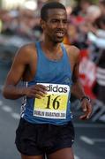 25 October 2004; Tomas Abyu, Ethiopia, crosses the line to finish eight in the adidas Dublin City Marathon 2004. Merrion Square, Dublin. Picture credit; Pat Murphy / SPORTSFILE