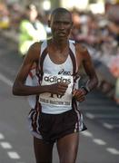 25 October 2004; Isaac Kimuge, Kenya, crosses the line to finish tenth in the adidas Dublin City Marathon 2004. Merrion Square, Dublin. Picture credit; Pat Murphy / SPORTSFILE
