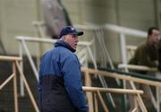 31 October 2004; UCD's Director of Sport Brian Mullins watches the game. AIB Leinster Club Hurling Championship, Portlaoise v UCD, O'Moore Park, Portlaoise, Co. Laois. Picture credit; Ray McManus / SPORTSFILE