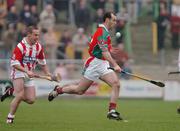 31 October 2004; Brian McEvoy, James Stephens, in action against Charlie Carter, Young Irelands. Kilkenny County Senior Hurling Final, James Stephens v Young Irelands, Nowlan Park, Kilkenny. Picture credit; Pat Murphy / SPORTSFILE