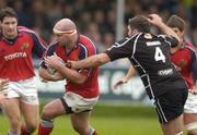 31 October 2004; John Hayes, Munster, is tackled by Andrew Newman, Neath-Swansea Ospreys. Heineken European Cup 2004-2005, Neath-Swansea Ospreys v Munster, The Gnoll, Neath, Wales. Picture credit; Brendan Moran / SPORTSFILE