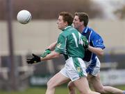 31 October 2004; Pascal Kelleghan, Leinster, in action against Conor Whelan, Munster. Martin Donnelly and Co. Interprovincial Football Championship Semi-Final, Leinster v Munster, O'Moore Park, Portlaoise, Co. Laois. Picture credit; Ray McManus / SPORTSFILE