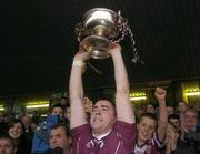 31 October 2004; Athenry captain Eugene Clonnan lifts the cup after victory over Portumna. Galway County Senior Hurling Final, Portumna v Athenry, Pearse Stadium, Galway. Picture credit; Damien Eagers / SPORTSFILE