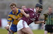 31 October 2004; Brian Feeney, Athenry, in action against Kevin Hayes, Portumna. Galway County Senior Hurling Final, Portumna v Athenry, Pearse Stadium, Galway. Picture credit; Damien Eagers / SPORTSFILE